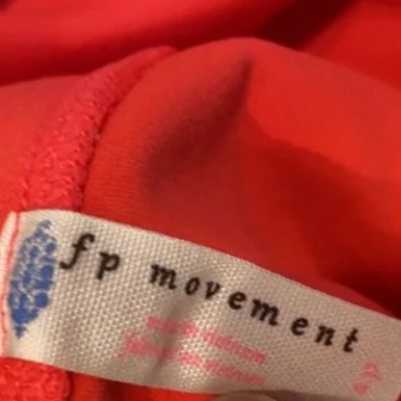 FP Movement High Rise Infinity Yoga Leggings in Vivid Coral - Picture 5 of 11